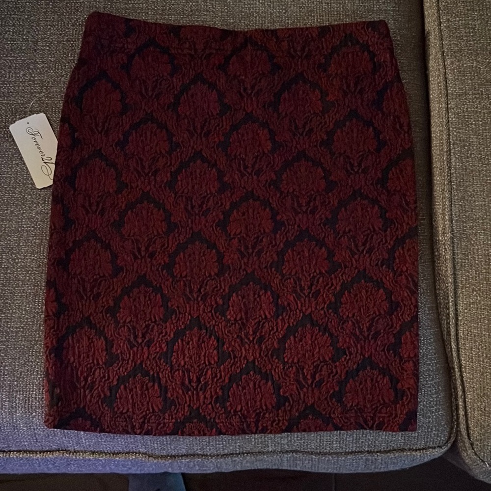 Burgundy and black skirt. Size small. Never worn. Brand new